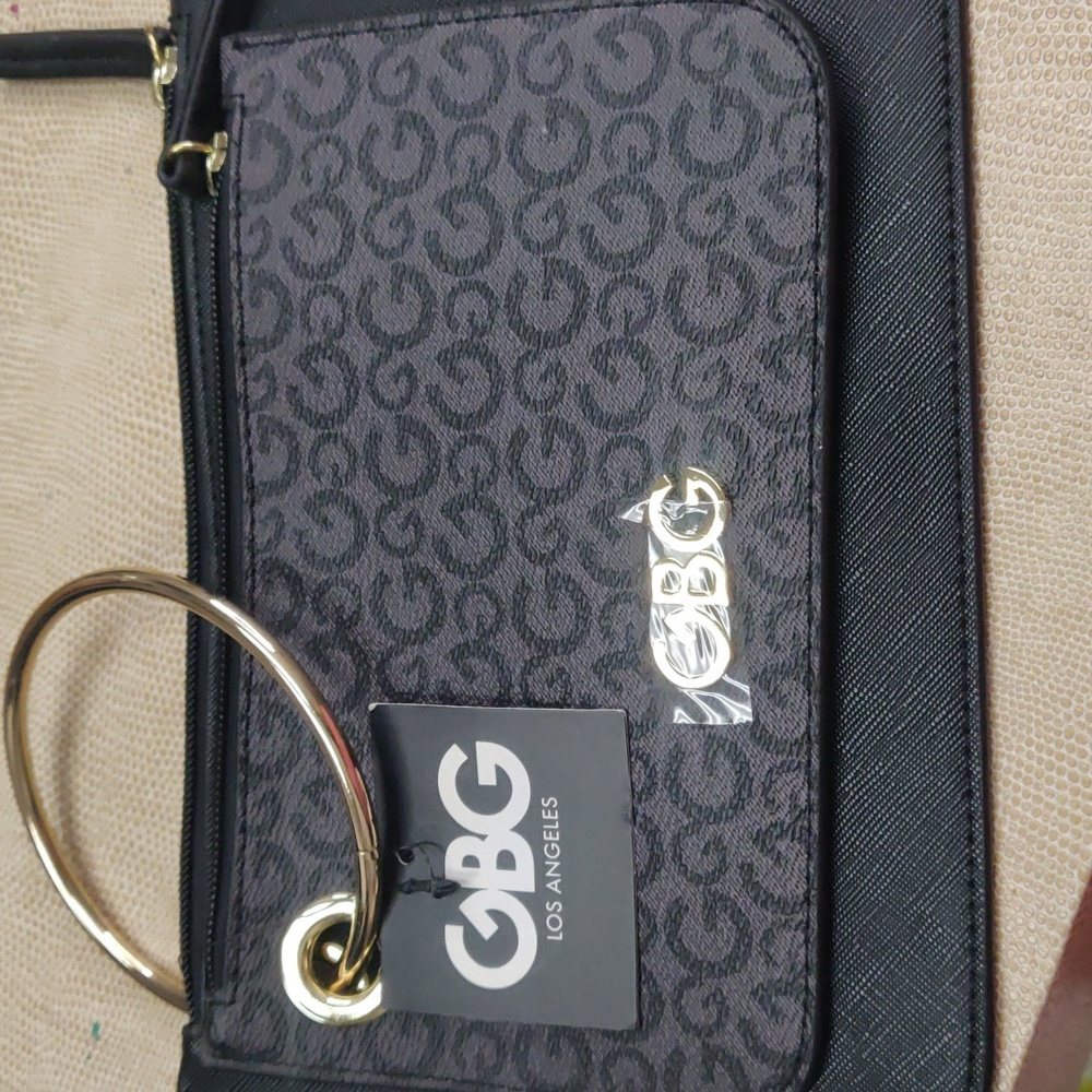 Black double wristlet bag